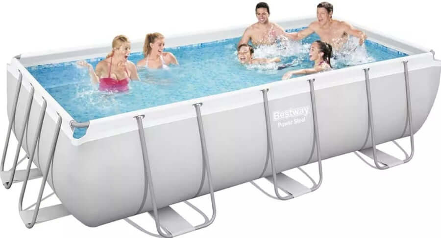 Outdoor swimming pool with people enjoying a fun summer gathering in a Bestway rectangular pool.