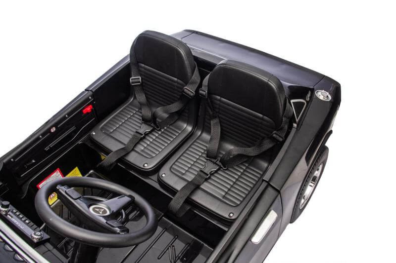 Interior of the Dodge Charger kids ride on car 24v featuring dual seats and steering wheel.