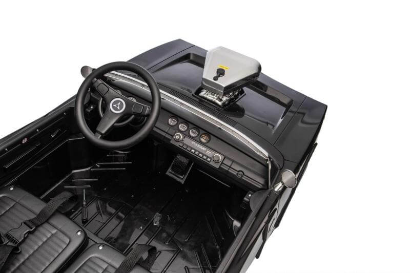 Dodge Charger kids ride on car 24v interior view showcasing steering wheel and dashboard features.