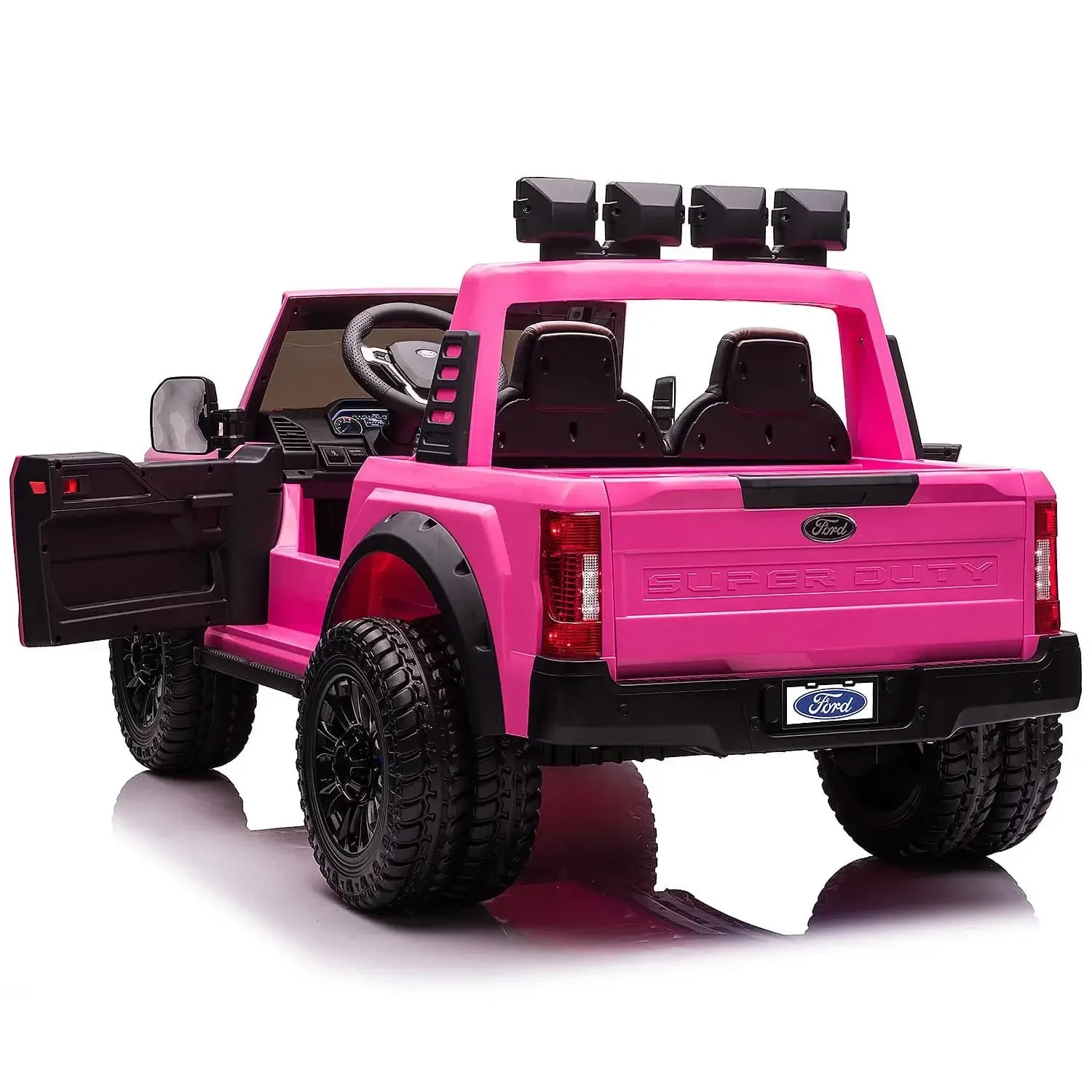 Pink kids ride-on Ford Super Duty truck with open door, spacious interior, and rugged tires, perfect for adventurous play.