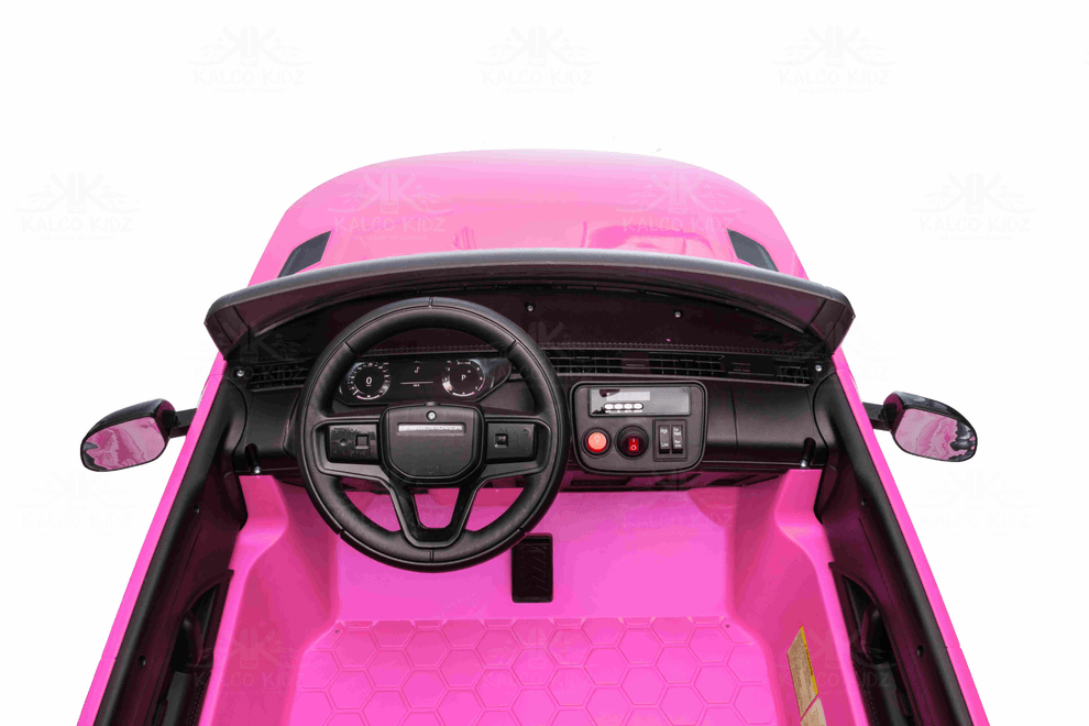 Range Rover Sport kids ride on car 24v 2 seater pink interior dashboard view with steering wheel and controls.
